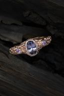 Red gold ring with tourmaline