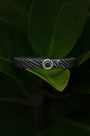Blackened titanium ring with diamond