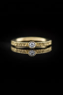 Yellow gold ring with a diamond