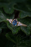 Yellow gold ring with sapphire and diamonds
