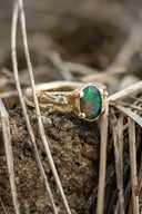 Yellow gold ring with opal and diamonds