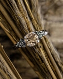 Silver ring with topaz and sapphires