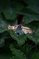 Yellow gold ring with sapphire and diamonds