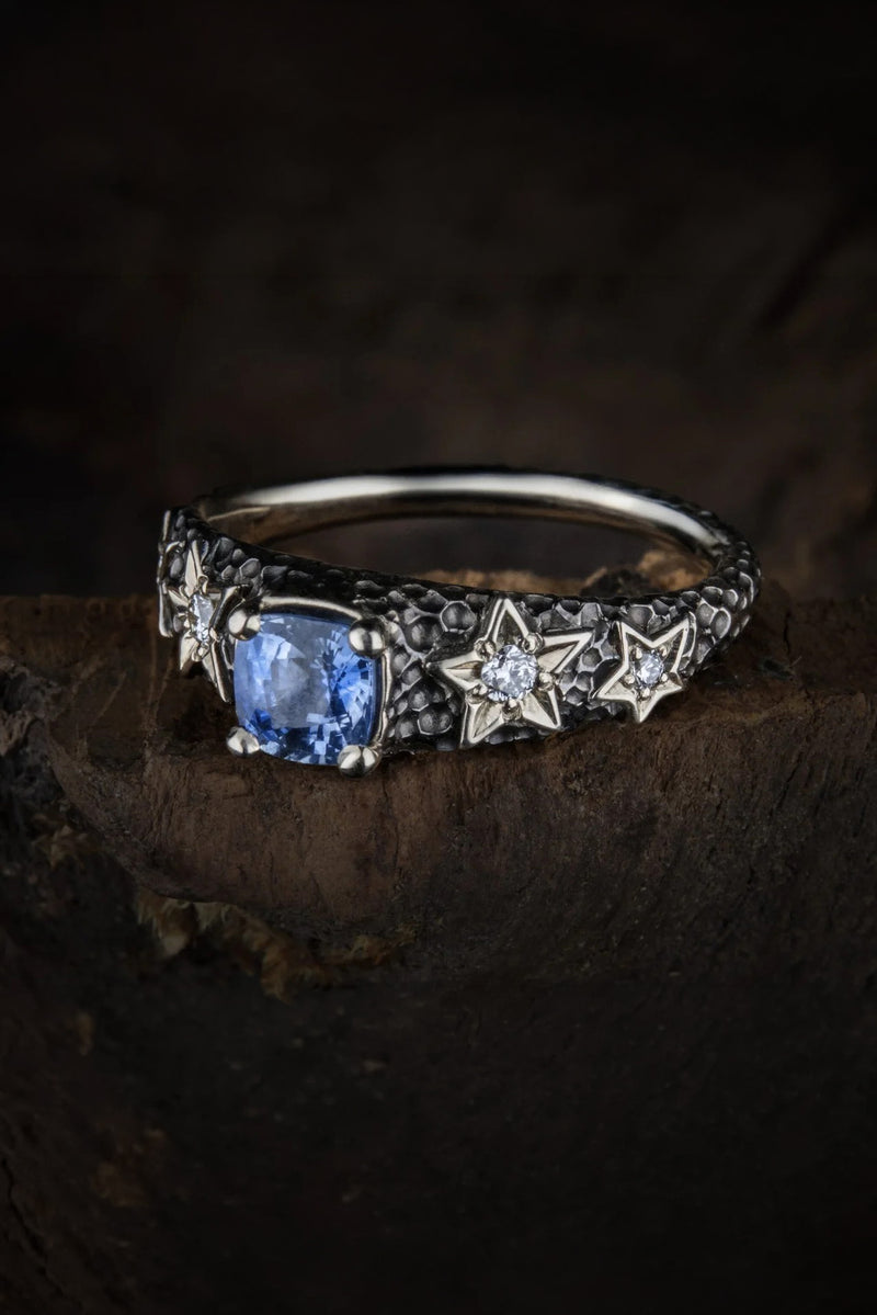 White gold ring with sapphire and diamonds